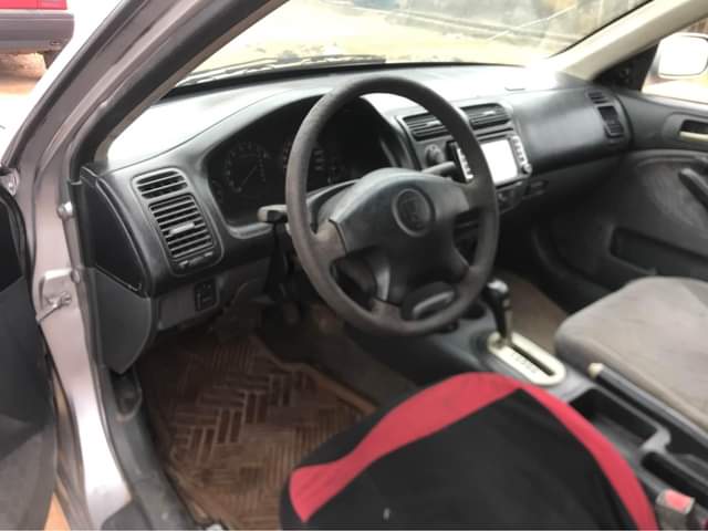 A picture of New Honda Civic just paint half painted engine an gear