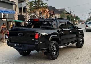 A picture of oks Toyota Tacoma Year 2018 Turbo Colour Black Keyless Wireless