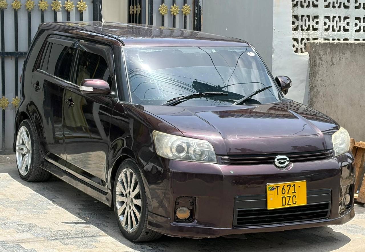 A picture of Toyota Rumion DZC Year 2008 Push to start Wine color