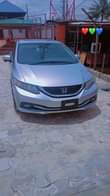 A picture of A year registered honda civic 2014 Baked from tokunbo First