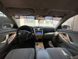 A picture of Sound Registered 2011 Camry with original android screen and Formica