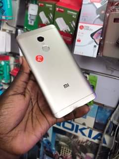 A picture of Redmi 4G 64gb Doubleline good camera 0704942807 with a receipt