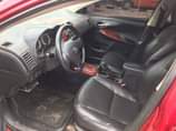 A picture of 2011 Corolla on a total distress sale extremely clean