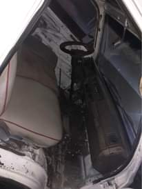 A picture of A White vannet Bus With Diesel engine