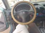 A picture of PEUGEOT 206 AT GOOD CONDITION DRIVES SMOOTH WITH ANDROID SCREEN