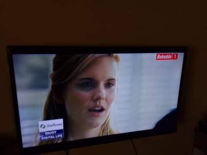 A picture of 32inch saach tv free to air plus laptop