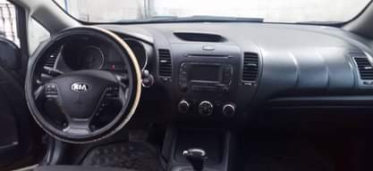 A picture of 2015 model Kia cerato keyless engine and gear ac chilling