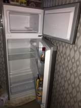 A picture of fridge kabati ya gesi kabati la nguo showcase ya tv