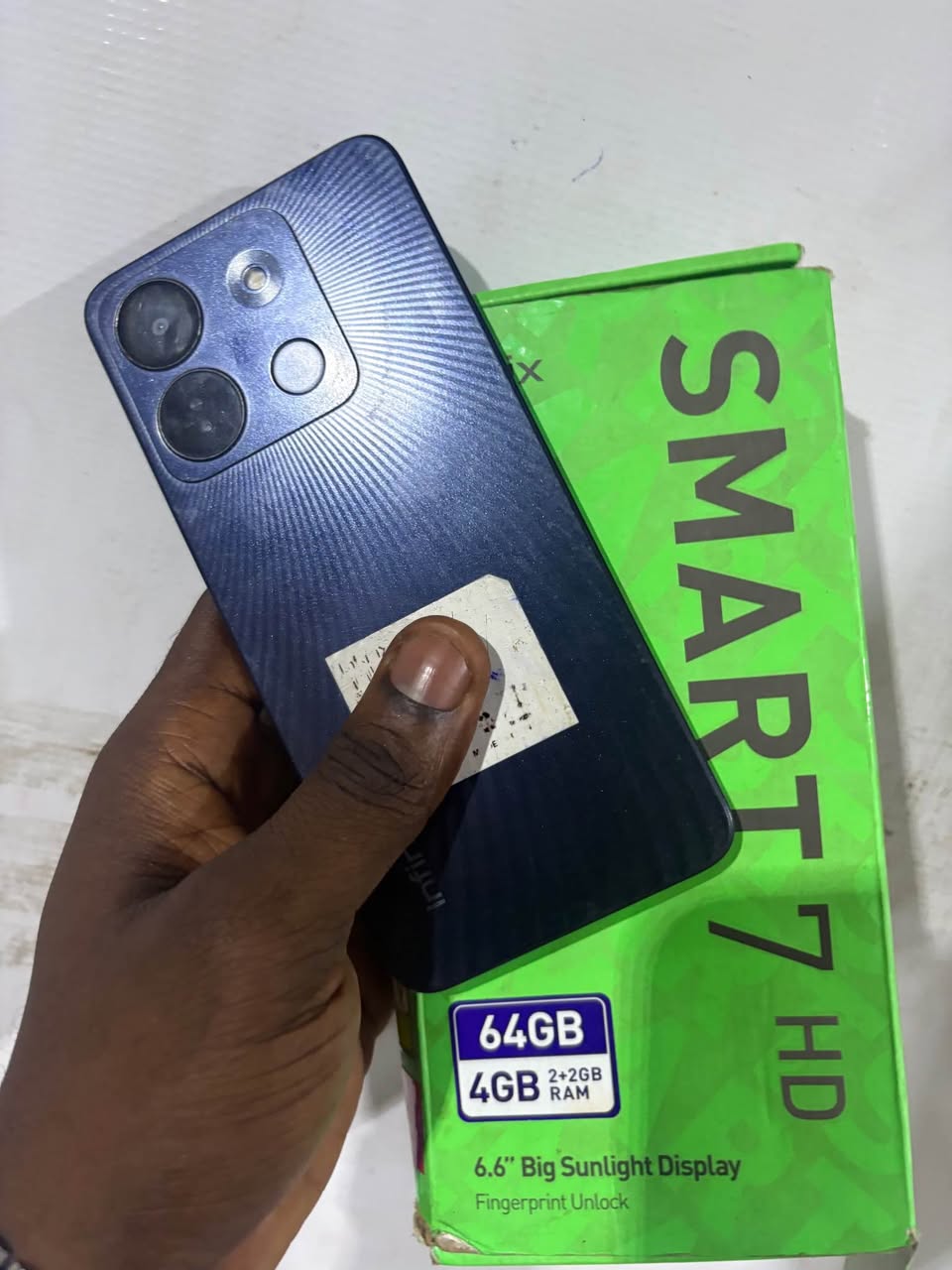 A picture of neat Infinix smart 7hd 4gb 64gb No repair history Has