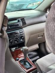 A picture of EXTREMELY SHARP PRE OWNED 2004 TOYOTA COROLLA LE CLEAN INTERIOR