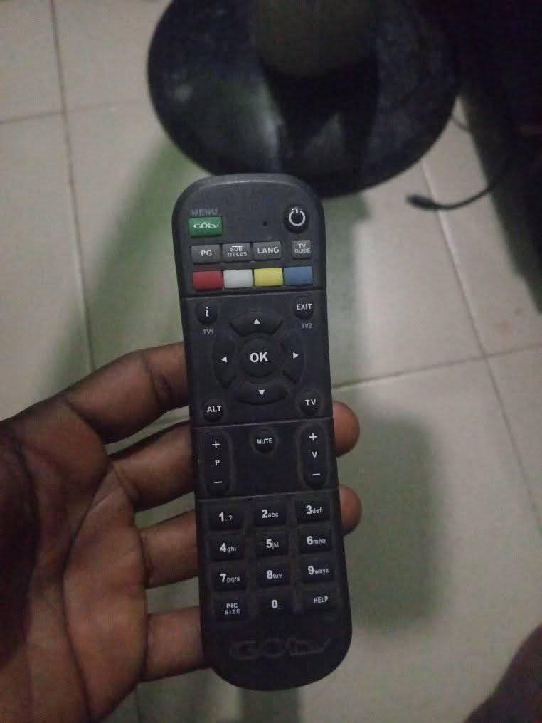 A picture of Gotv decorder antenna and remote