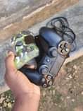 A picture of PLAYSTATION 4 WITH TWO PADS AND 4GAMES CLEAN AS NEW