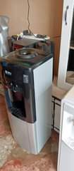 A picture of SPJ water dispenser with Hot water Warm water and Cold