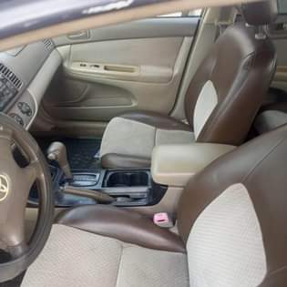 A picture of 04 Toyota Camry 4 plug Engine gear and ac are