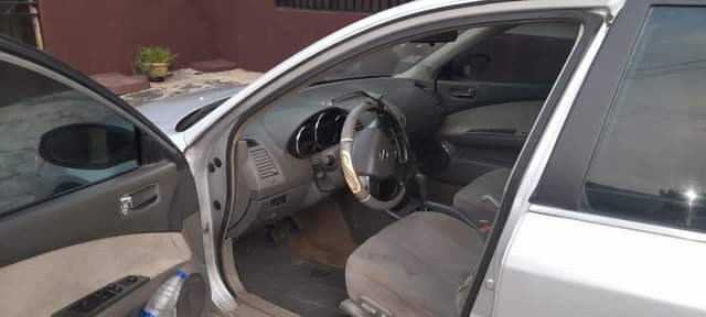 A picture of DELAY IS DANGEROUS 2004 NISSAN ALTIMA Painted on first body