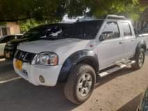 A picture of 2014 Nissan Hardboard White