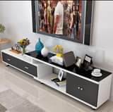 A picture of Tv show case Coffee table ukihitaji kimoja unapata