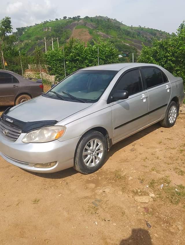 A picture of Distress Very sharp Toyota Corolla LE 2004 everything blessed with