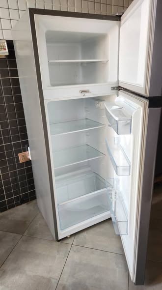 A picture of Hisense dispenser fridge 270 litres working perfectly