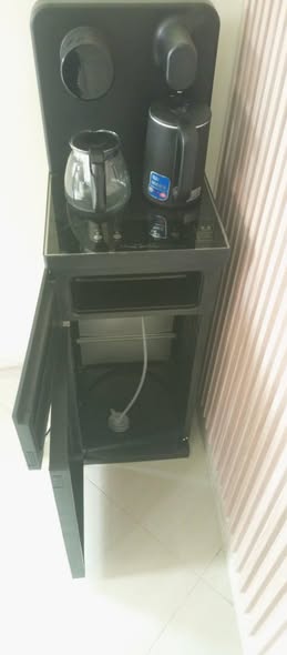 A picture of Am selling a used water dispenser at 320k