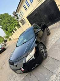 A picture of 08104854872 Good deal V Clean 2009 Toyota Camry Baked on