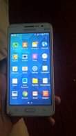 A picture of Samsung Galaxy grand prime Has some craxk