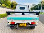A picture of SUZUKI CARRY DMG Cc 650 Rim Sports Manual gear Bei