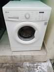 A picture of LG inverter direct drive 7kg washing machine clean like new