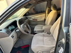 A picture of FOR SALE CLEAN USED TOYOTA COROLLA 2004 MODEL HAS COOLING