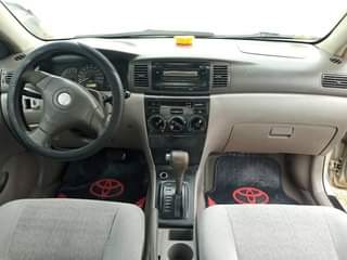 A picture of EXTREMELY CLEAN 2004 MODEL TOYOTA COROLLA Untampered Engine Untampered Gear