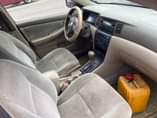 A picture of Sharp 2004 Toyota Corolla with sound engine and gear AC