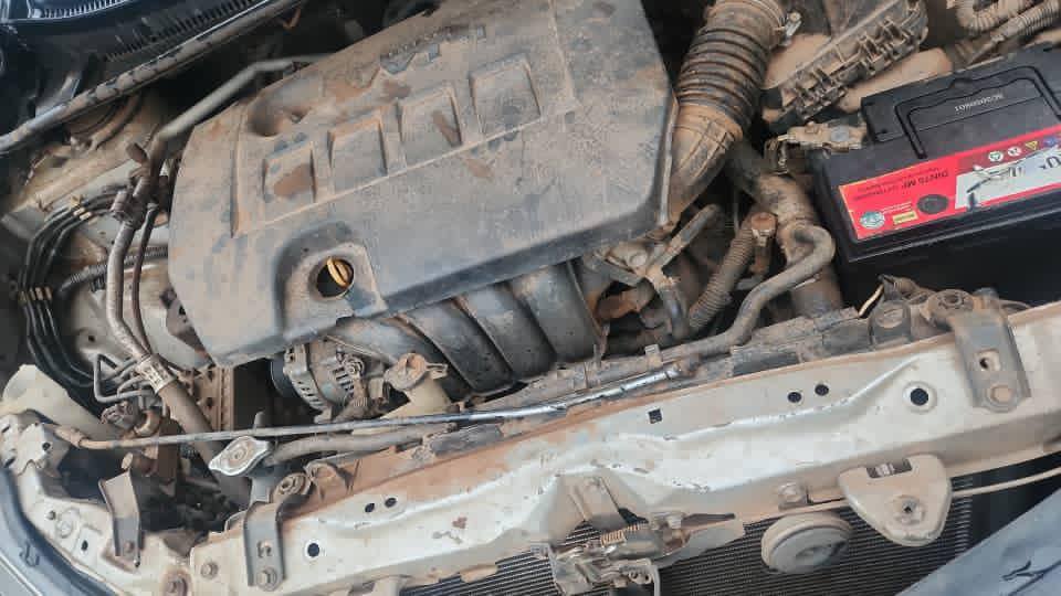 A picture of elgium standard Toyota corolla 2015 model for sale.