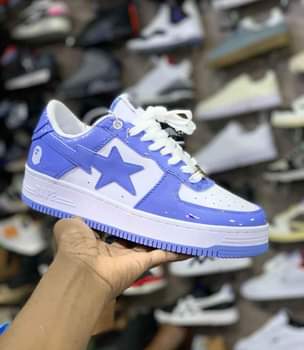 A picture of Sneakers available Call whatsapp 0757010109 Ugx 150000 Inbox for rders