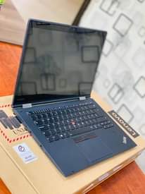 A picture of Laptops and camera