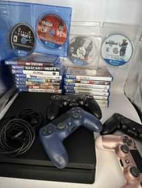 A picture of PS4 FULL SET SLIGHTLY USED BUT STILL PERFECT