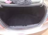 A picture of 2014 model accent bought brand new everything intact 2 1m