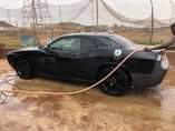 A picture of Black Dodge Challenger Toks