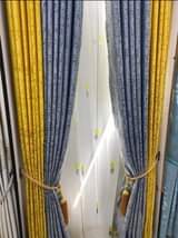 A picture of Curtains curtain rods and cushions