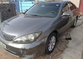 A picture of Toyota Camry 04 driving smooth Buy and paint bumper only