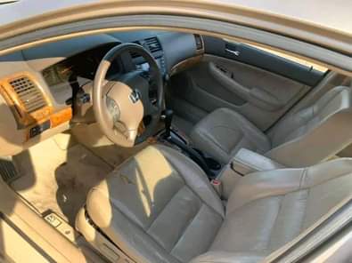 A picture of Full option Well maintained Clean gold color Honda accord With
