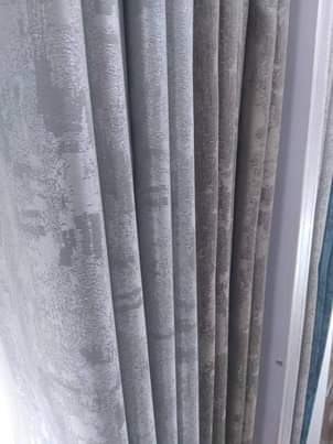 A picture of Curtains and rods