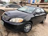 A picture of 2004 FEW MONTHS REGISTERED TOYOTA COROLLA LE FIRST PAN BODY
