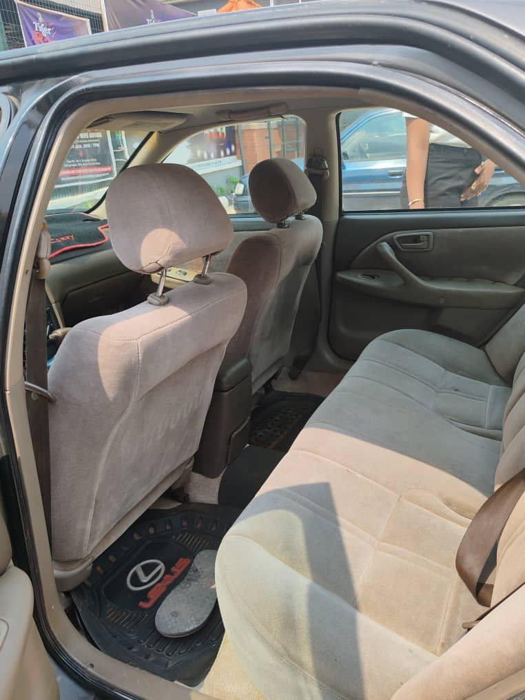 A picture of Extremely Clean Registered Toyota Camry Tiny Light