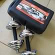 A picture of 20Kg Adjustable Dumbells available 0773225558