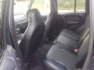 A picture of Jeep liberty 2005 untampered engine and gear chilling a c