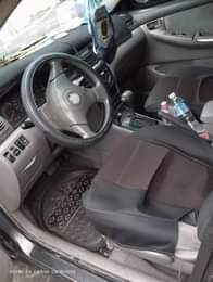 A picture of Toyota Corolla model 04 engine gear and A C very