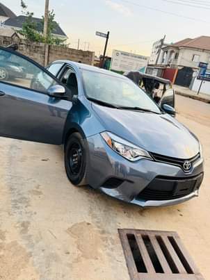 A picture of 2014 Toks Toyota Corolla. First body AC mortuary standard
