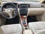 A picture of 2004 FEW MONTHS REGISTERED TOYOTA COROLLA LE FIRST PAN BODY