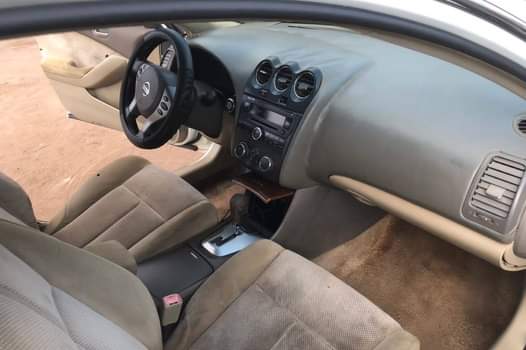 A picture of Nisan Optima 20007 model very clean first body pan engine