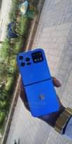 A picture of NEW APPLE LOG BUTTON PHONE WITH TRIPPLE CAMERA APPLE LOG